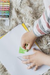 boy-painting-something-home
