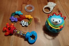 512px-Assortment_of_five_baby_rattles