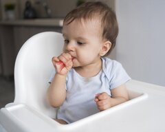 adorable-baby-playing-with-food